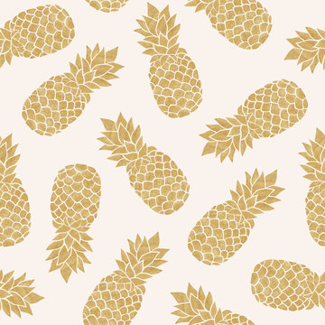 Seamless pattern with gold pineapples. Summer tropical background