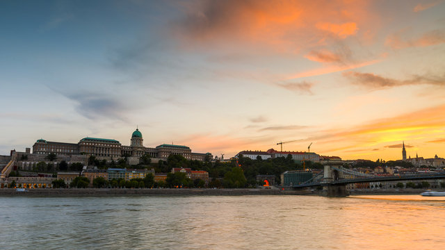 Sunset over Buda castle and historic town centre of Budapest, Hungary.
