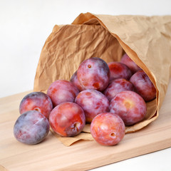 Plum spilled from the bag.