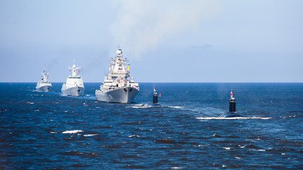 A line of modern russian military naval battleships warships in the row, northern fleet and baltic...