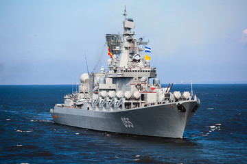 Fototapeta na wymiar A line of modern russian military naval battleships warships in the row, northern fleet and baltic sea fleet in the open sea