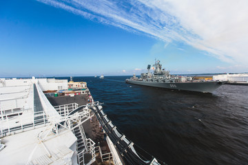 A line of modern russian military naval battleships warships in the row, northern fleet and baltic sea fleet in the open sea