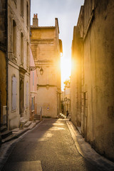 Fototapeta na wymiar An Alley at Sunset in Arles - France
