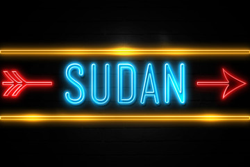 Sudan  - fluorescent Neon Sign on brickwall Front view