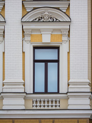 White plastic window made in a classic style. Architecture