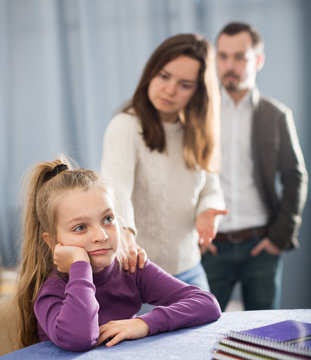 Parents Lecturing Daughter