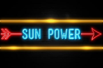 Obraz premium Sun Power - fluorescent Neon Sign on brickwall Front view