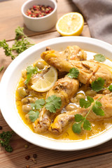 chicken leg cooked with lemon,coriander and olive