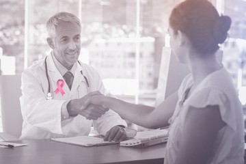 Obraz premium Composite image of breast cancer awareness ribbon