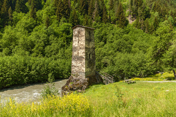 Fototapeta na wymiar Svan fortresses view of ancient Svan tower in village Ushguli. Svaneti, Georgia