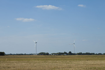 Fototapeta na wymiar Wind turbines farm
