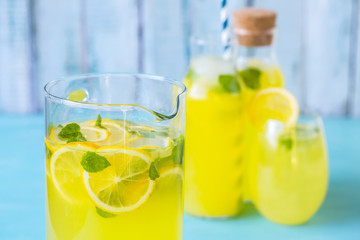 Lemon juice on a blue background