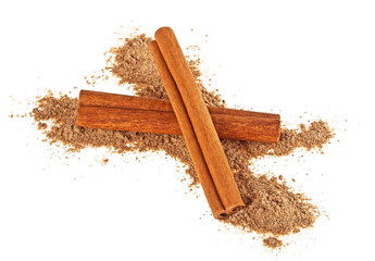 Cinnamon sticks and powder on white background