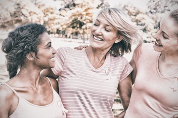 Volunteers supporting breast cancer awareness