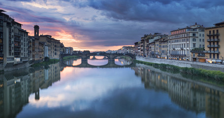 Last lights in sky above river in Florence in Italy