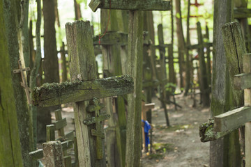 Grabarka, Poland - August 12, 2017: Orthodox crosses brought by pilgrims to the Holy Mount of Grabarka. Podlaskie Voivodeship. Polish Orthodox pilgrimage center.