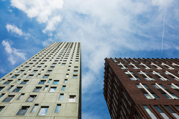 Fototapeta na wymiar modern palaces seen from below in Rotterdam