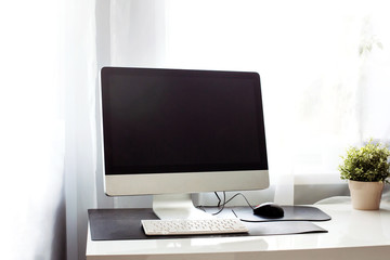 Desk table computer laptop white table work place  background copy space