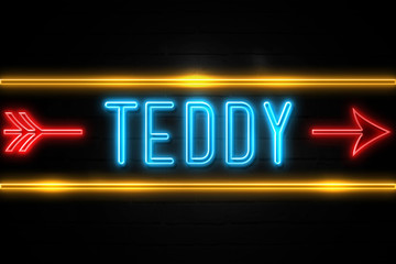Obraz premium Teddy - fluorescent Neon Sign on brickwall Front view
