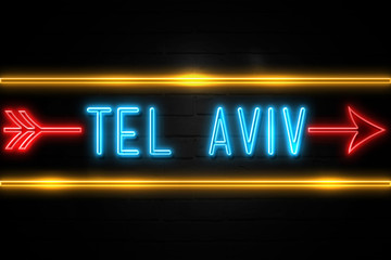 Obraz premium Tel Aviv - fluorescent Neon Sign on brickwall Front view