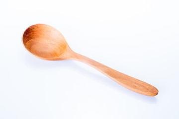 Wooden spoon isolated on white background