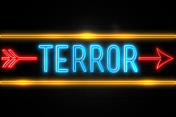 Obraz premium Terror - fluorescent Neon Sign on brickwall Front view