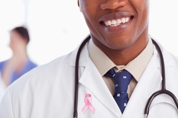Composite image of close-up of prostate cancer awareness ribbon 