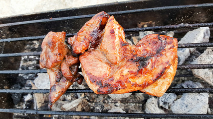 grilling thin pork chops on flame