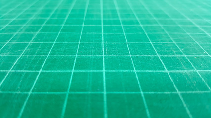 close-up green cutting mat rubber-stamp background