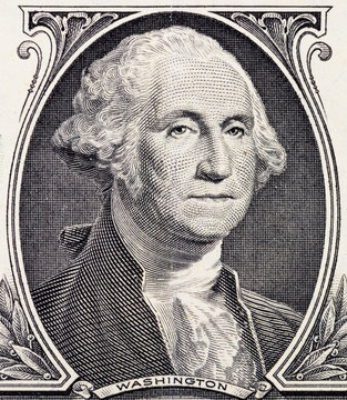 Close-up of George Washington portrait on one dollar bill. United States money, macro
