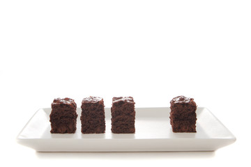 Homemade chocolate brownies served on a plate