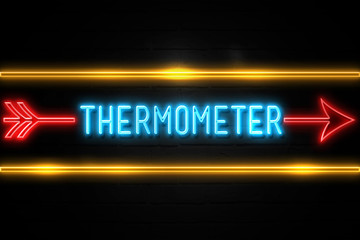 Thermometer  - fluorescent Neon Sign on brickwall Front view