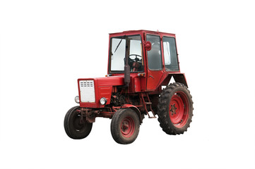 Old red farm tractor isolated