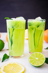 Transparent refreshing natural drink with cucumber