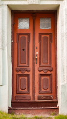 The door of the old European building. Exterior design element of ancient Lvov. Example of world architectural heritage.