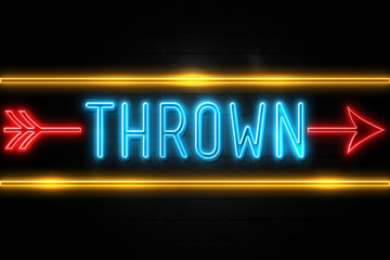 Obraz premium Thrown - fluorescent Neon Sign on brickwall Front view