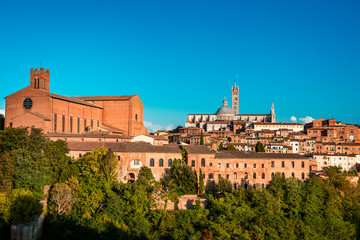 Secenery of Siena, a beautiful medieval in Tuscany, Italy with view of the Dome and Bell Tower of Siena Cathedral 