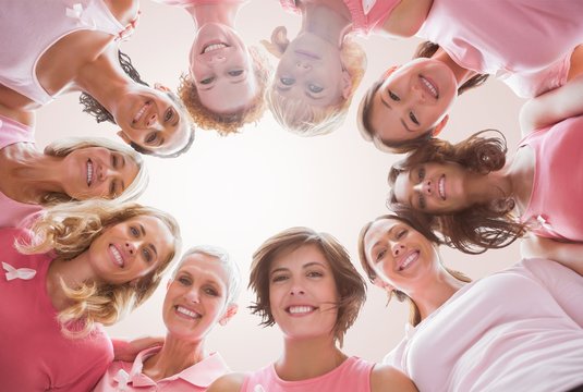 Composite image of low angle portrait of female friends