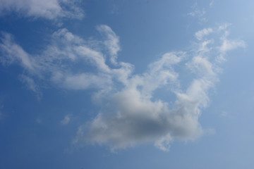 Naklejka na ściany i meble 青空と雲「空想・雲のモンスター（画面左上付近に人物や神などのイメージ）好好爺、偉大なお告げ、神の力、神話などのイメージ
