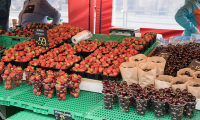 Fruit on the shelves at famous fish market in Bergen in summer, Norway