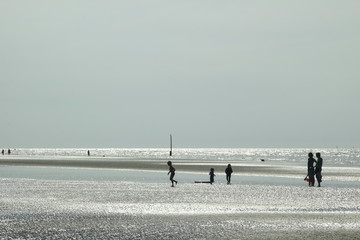 Low tide. A summer evening on the beach of Nieuwpoort Belgium.
