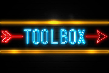 Toolbox  - fluorescent Neon Sign on brickwall Front view