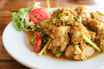 closeup stir fried crab with egg and curry powder, Thai style