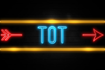 Obraz premium Tot - fluorescent Neon Sign on brickwall Front view