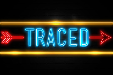 Traced  - fluorescent Neon Sign on brickwall Front view