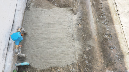 Cement concrete finish after repairing and change the new water pipe