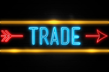 Obraz premium Trade - fluorescent Neon Sign on brickwall Front view