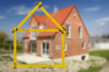 Meterstab und Hausbau