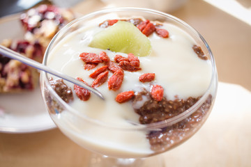 vegan chocolate pudding with chia and banana in glass
