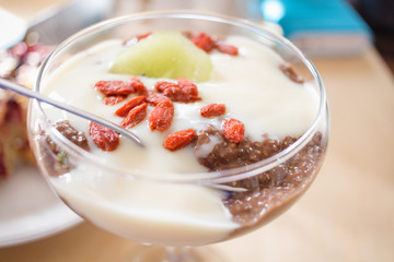 vegan chocolate pudding with chia and banana in glass